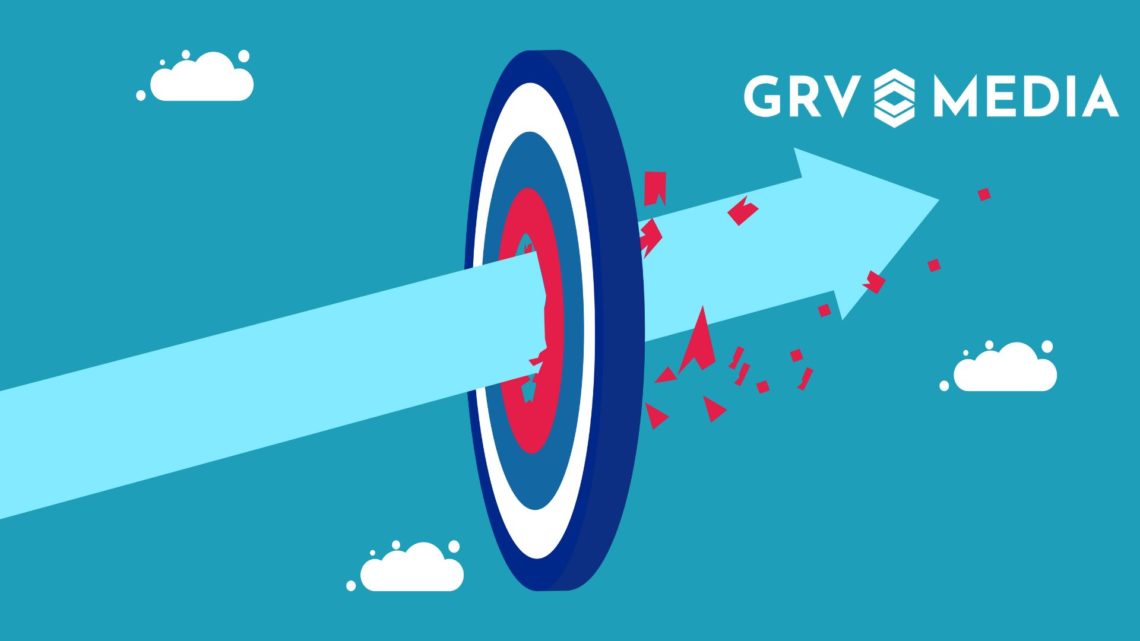 A target board with an arrow breaking through it on a mid-blue background. Around the target and arrows, there are white clouds. The GRV Media logo...